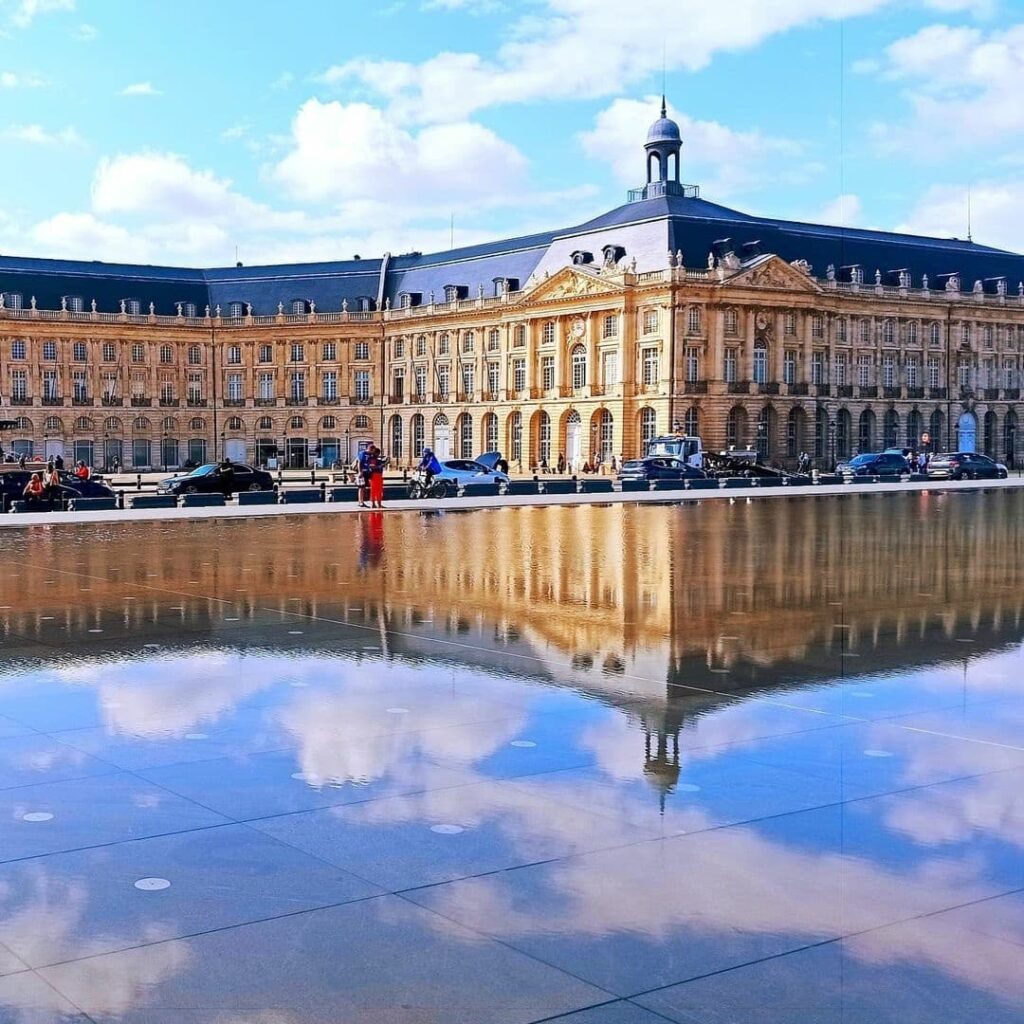 Reflection of Place de la Bourse in the water mirror Bordeaux