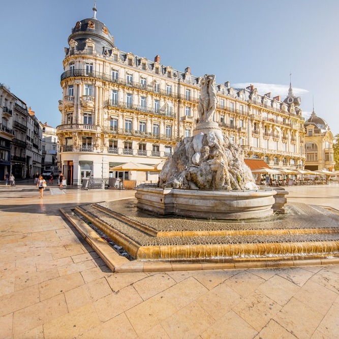 People and cafés at Place de la Comédie in Montpellier