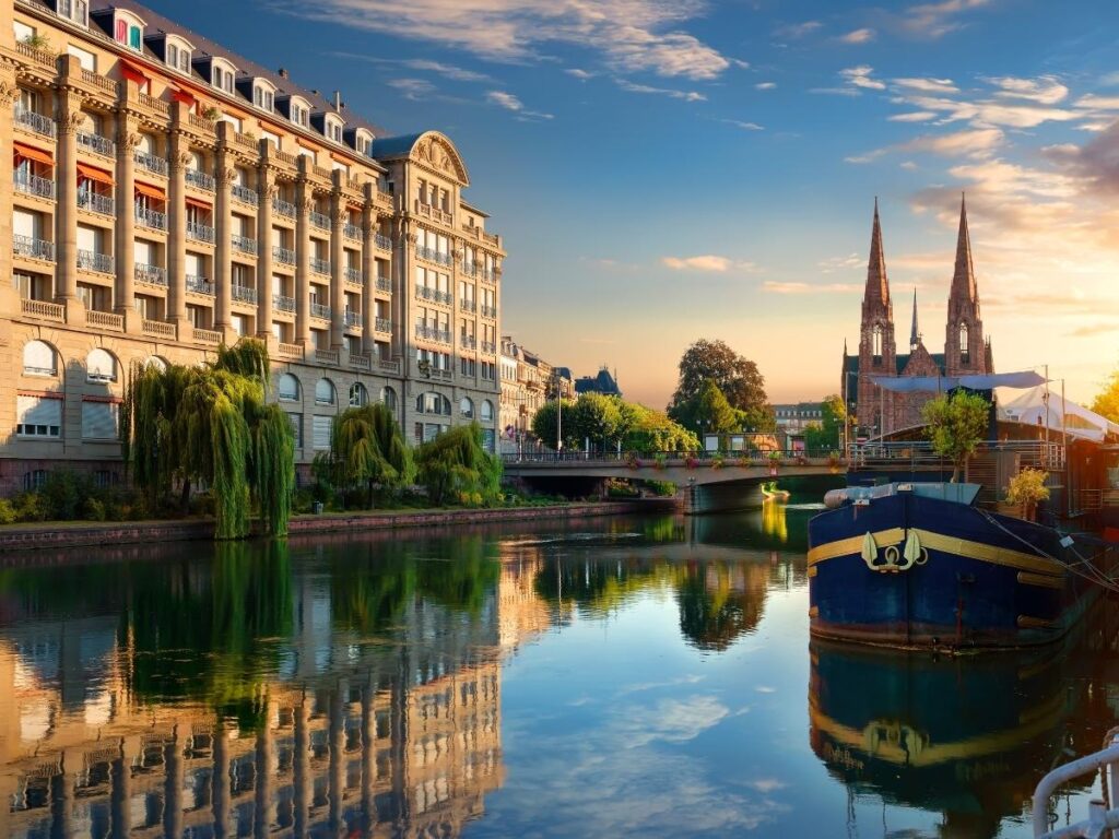 People walking along Strasbourg canals in summer