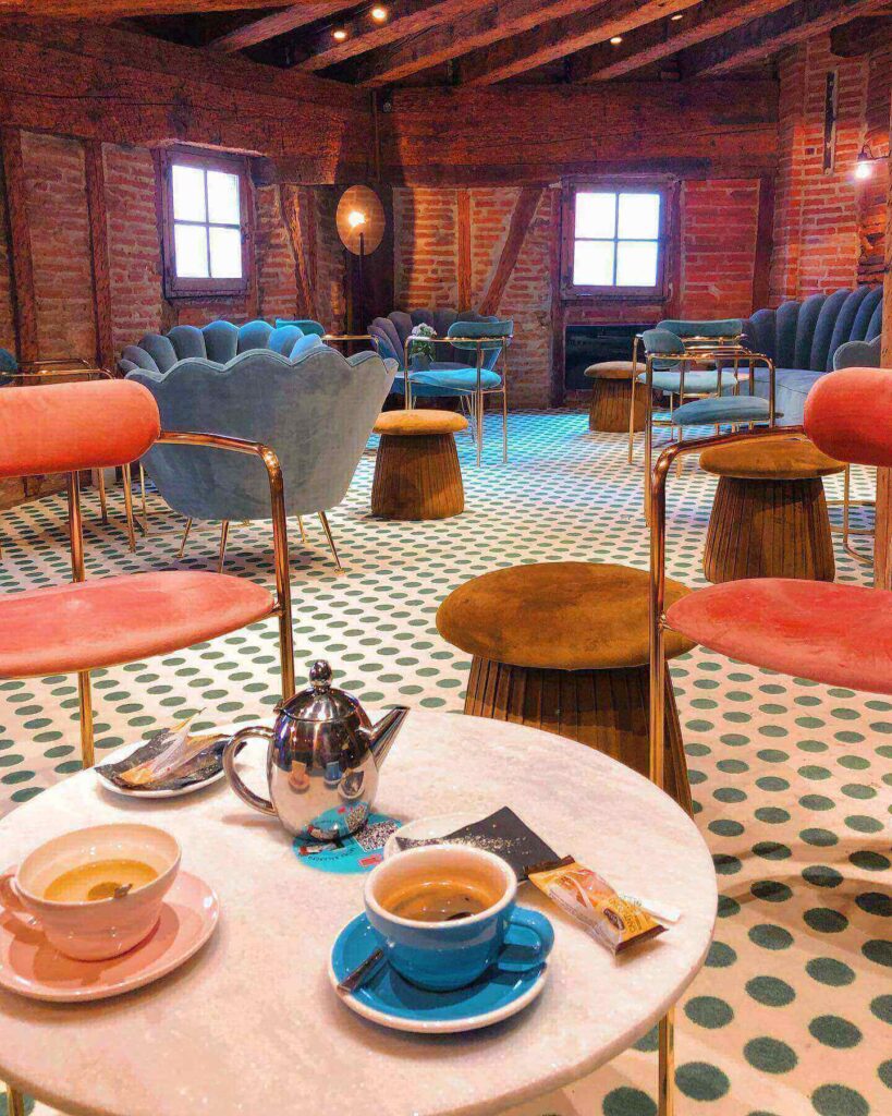 Croissant and coffee on a café table in Toulouse during a slow morning