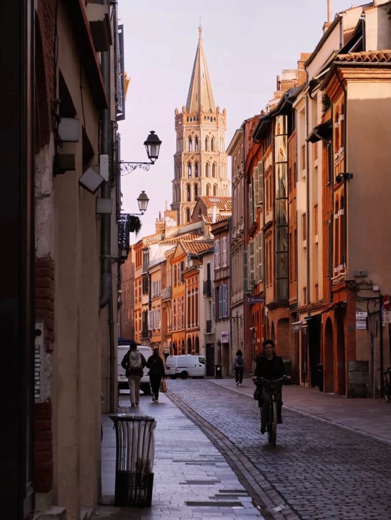 Walking through Toulouse old town streets during the day