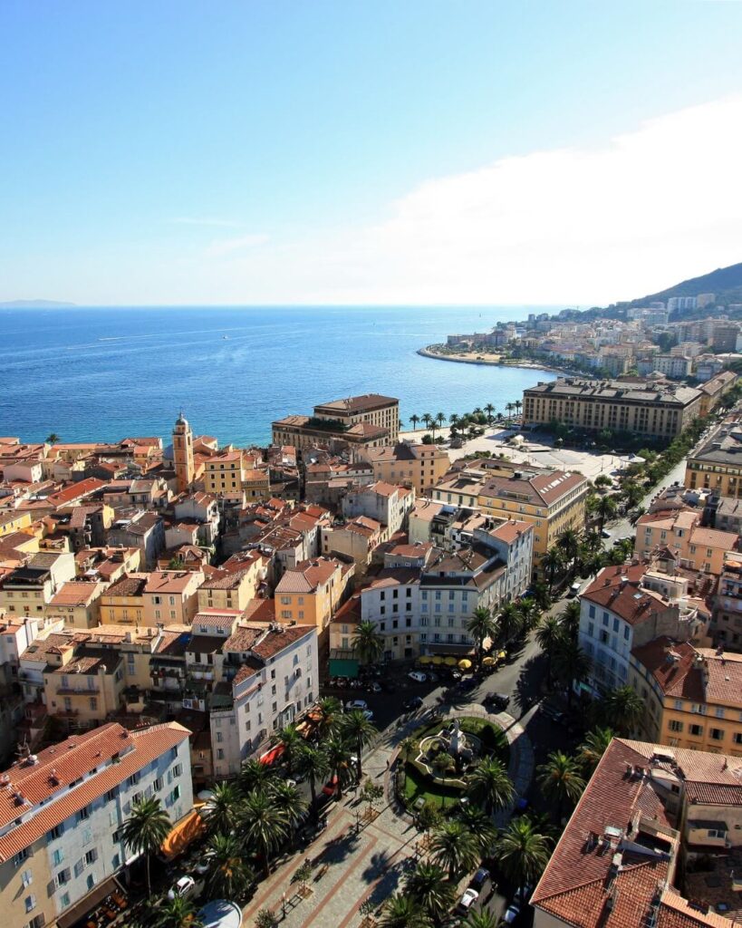 Panoramic view of Ajaccio coastline with sea and mountains in Corsica