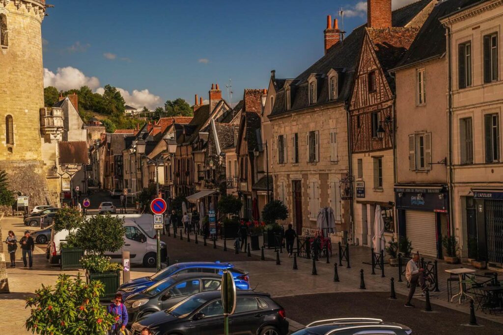 Busy summer atmosphere in Amboise with people and cafés