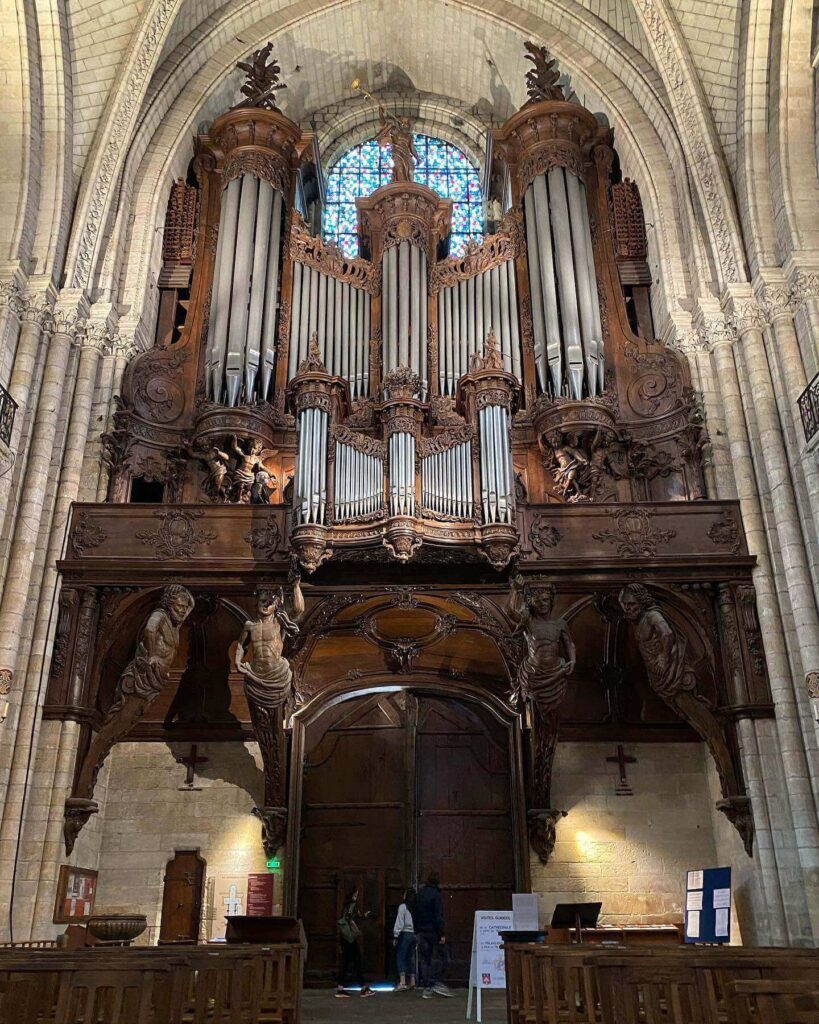 Angers Cathedral interior with stained glass windows