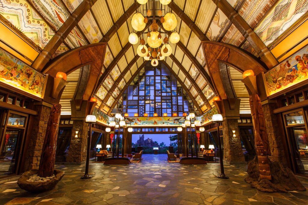 Exterior view of Aulani, A Disney Resort & Spa in Ko Olina, Oahu, featuring family-friendly beachfront resort, Hawaiian-inspired architecture, lagoons, water slides, and tropical landscaping.