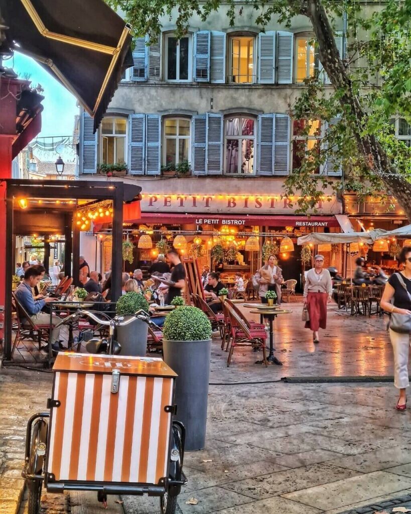Outdoor café dining scene in Avignon Old Town