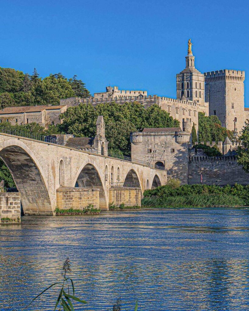 Historic stone walls surrounding Avignon Old Town in Provence
