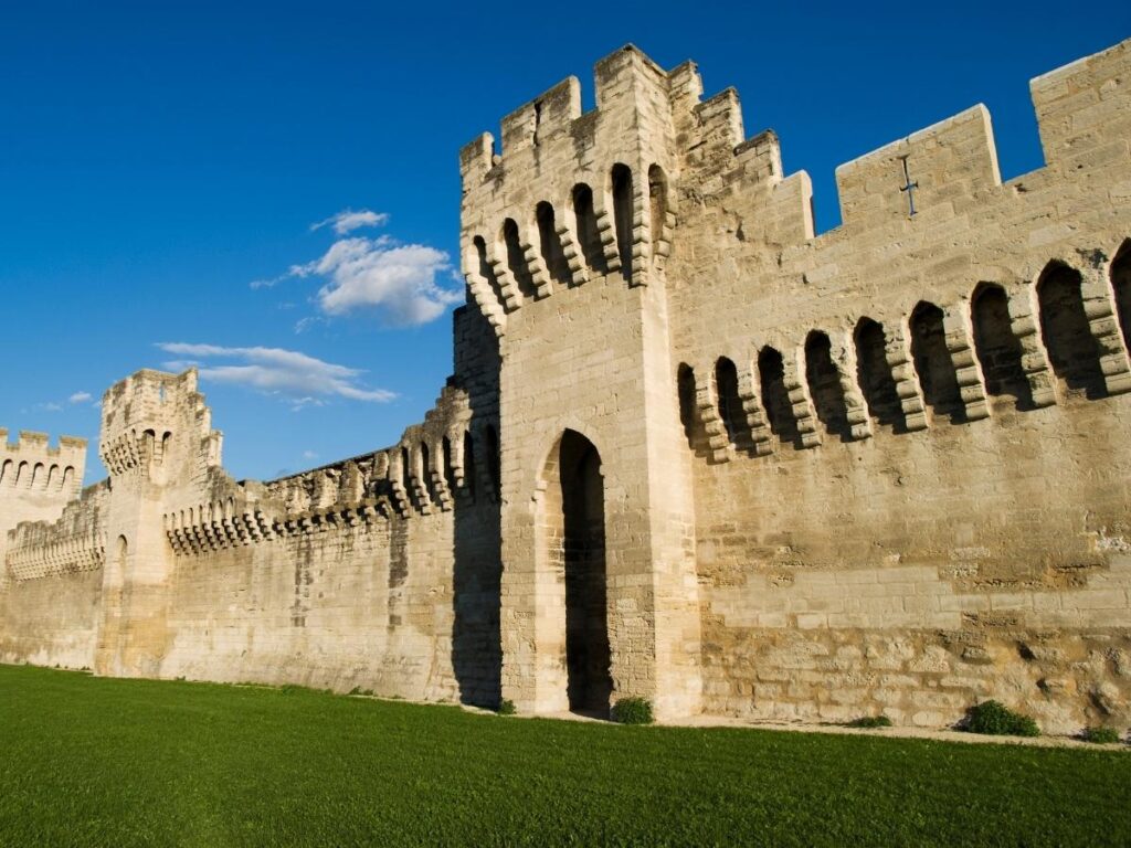 Stone defensive walls surrounding Avignon city