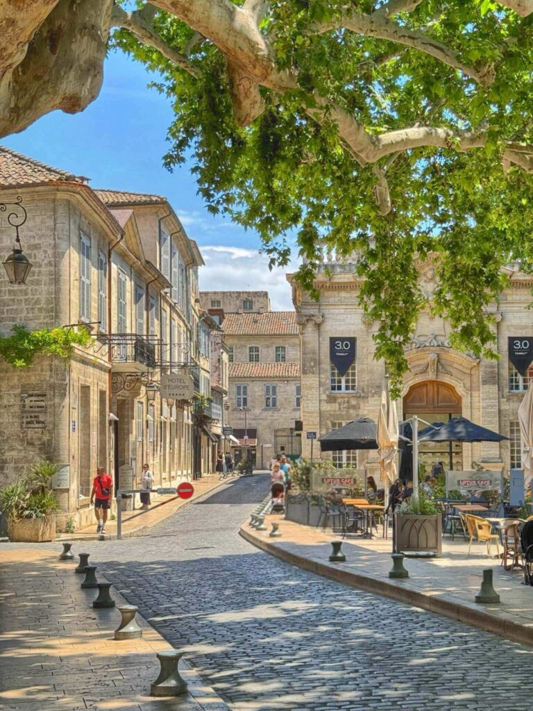 Walking through quiet streets in Avignon Old Town