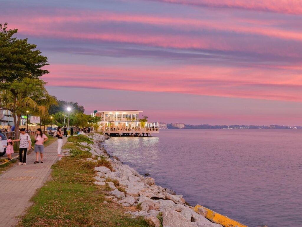 Seafront promenade in Bastia with walking path and coastal views