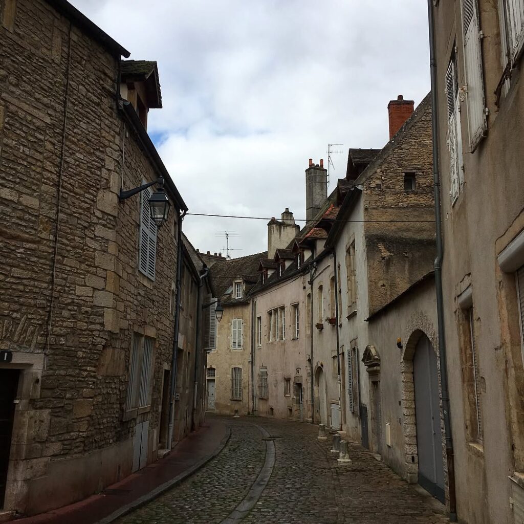 Walking through Beaune old town streets in the morning