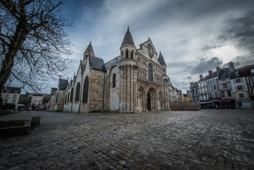 View of Notre-Dame la Grande and historic streets in Poitiers France
