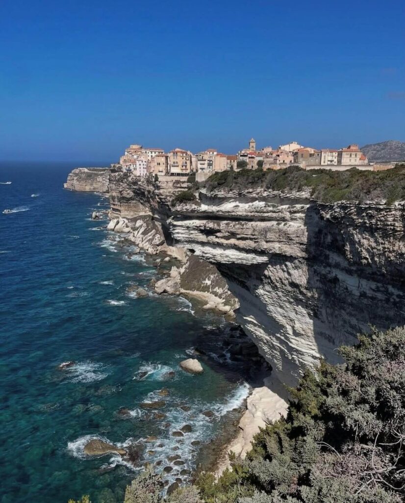 Bonifacio town sitting on white limestone cliffs in southern Corsica