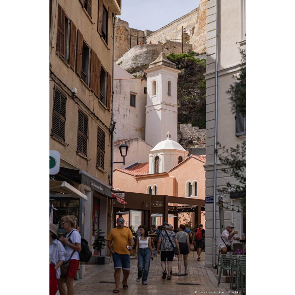 Bonifacio marina with harbor, restaurants, and evening activity