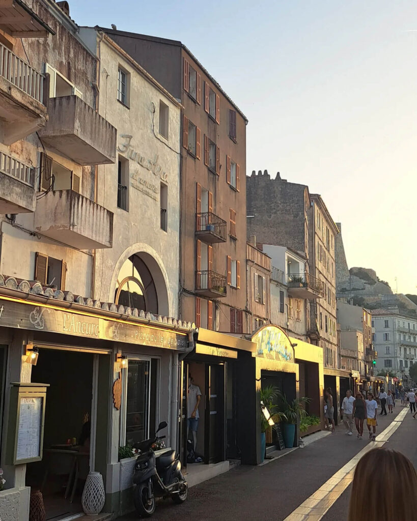 Quiet morning streets in Bonifacio old town with soft early light