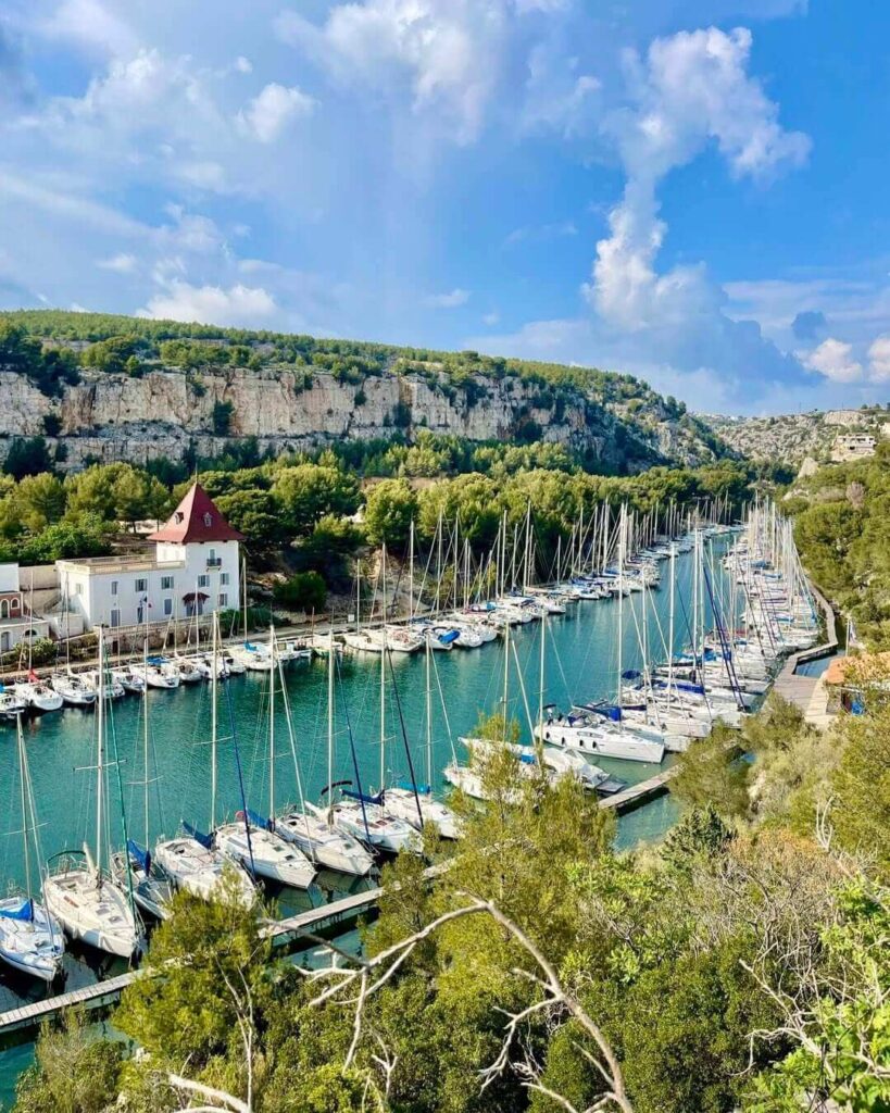 Calanque de Port Miou with long narrow inlet and boats near Cassis