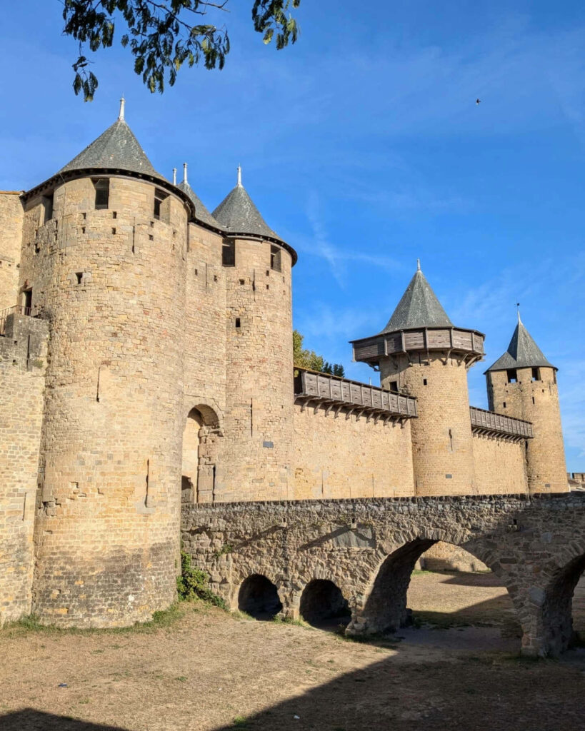 Entrance gate to La Cité de Carcassonne with stone towers