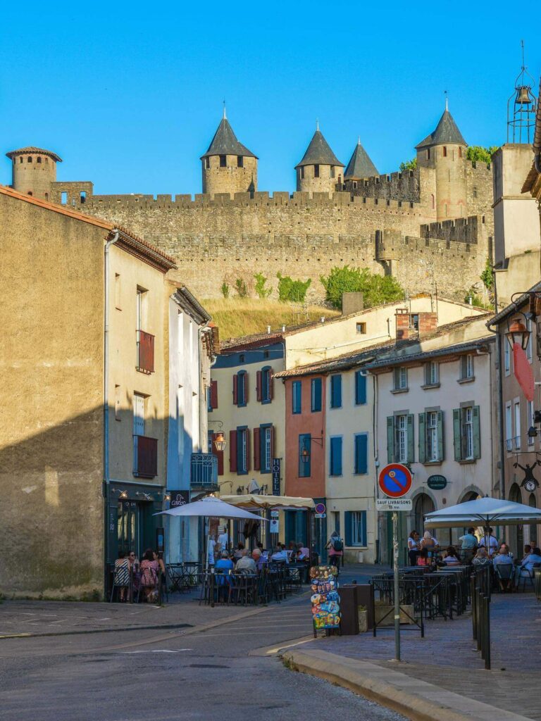 Busy streets inside Carcassonne medieval city during the day