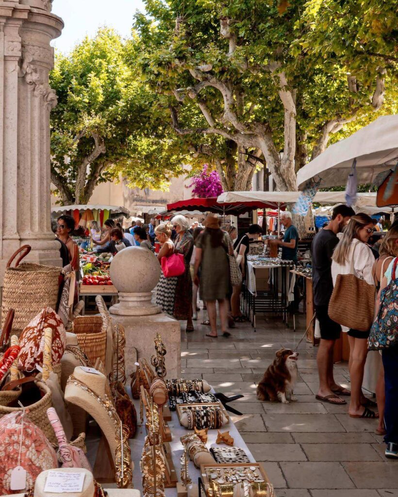 Local market in Cassis with fresh produce and small vendor stalls