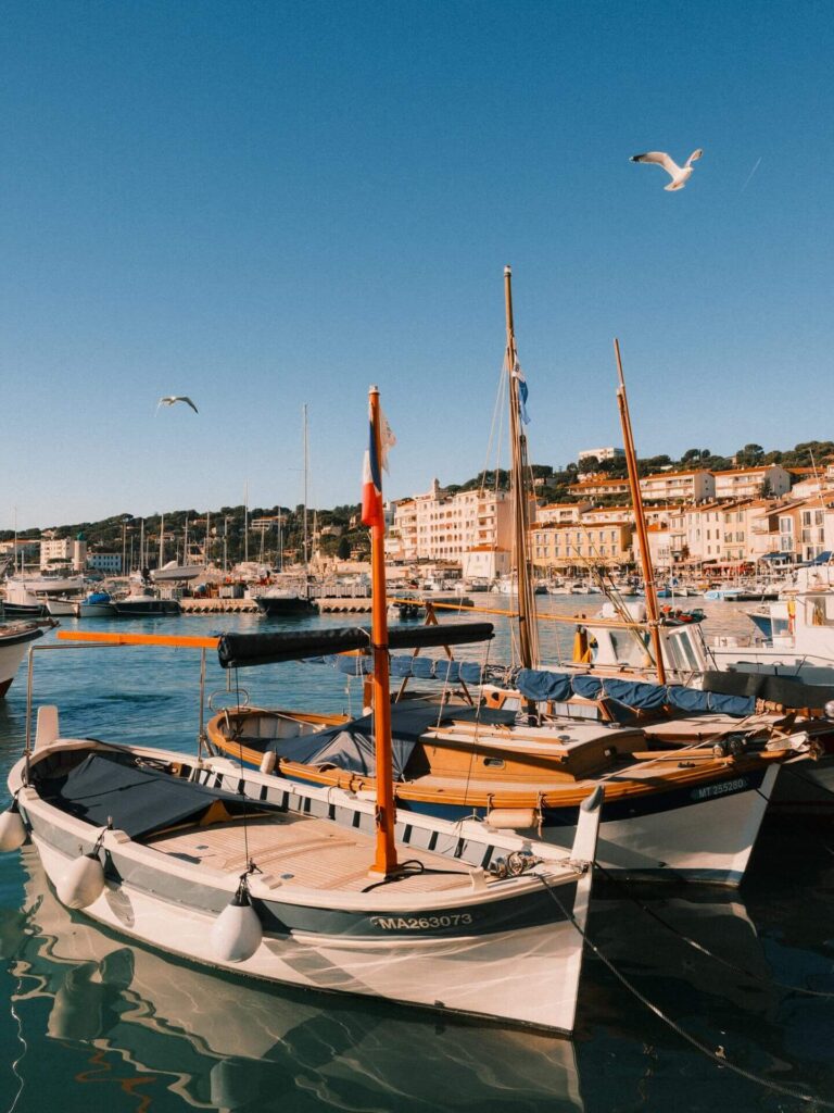 Overview of Cassis showing the harbor, town, and surrounding coastline