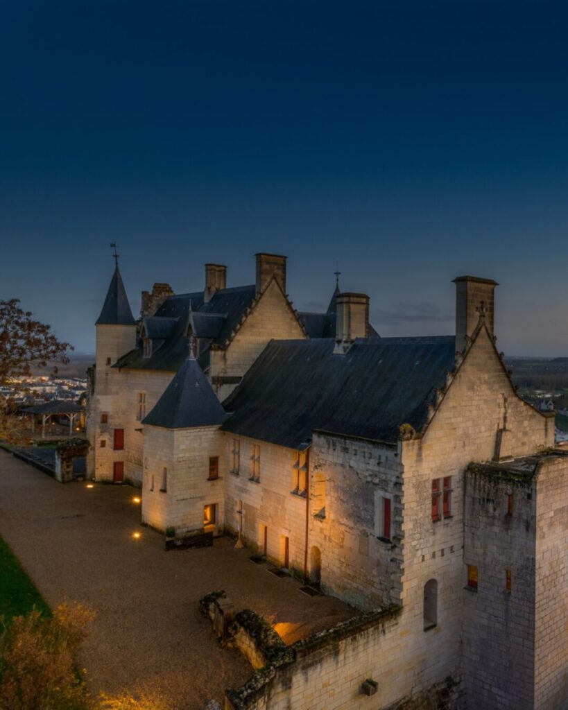 Historic hotel in Chinon old town surrounded by stone buildings