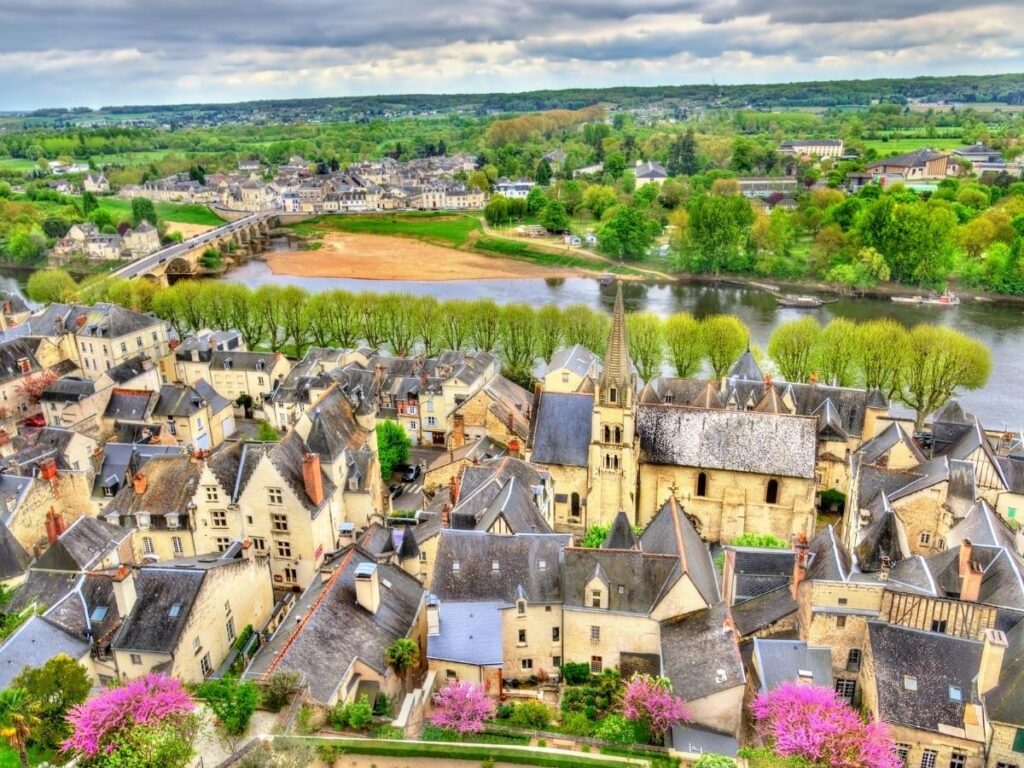 Quiet narrow street in Chinon old town with stone buildings