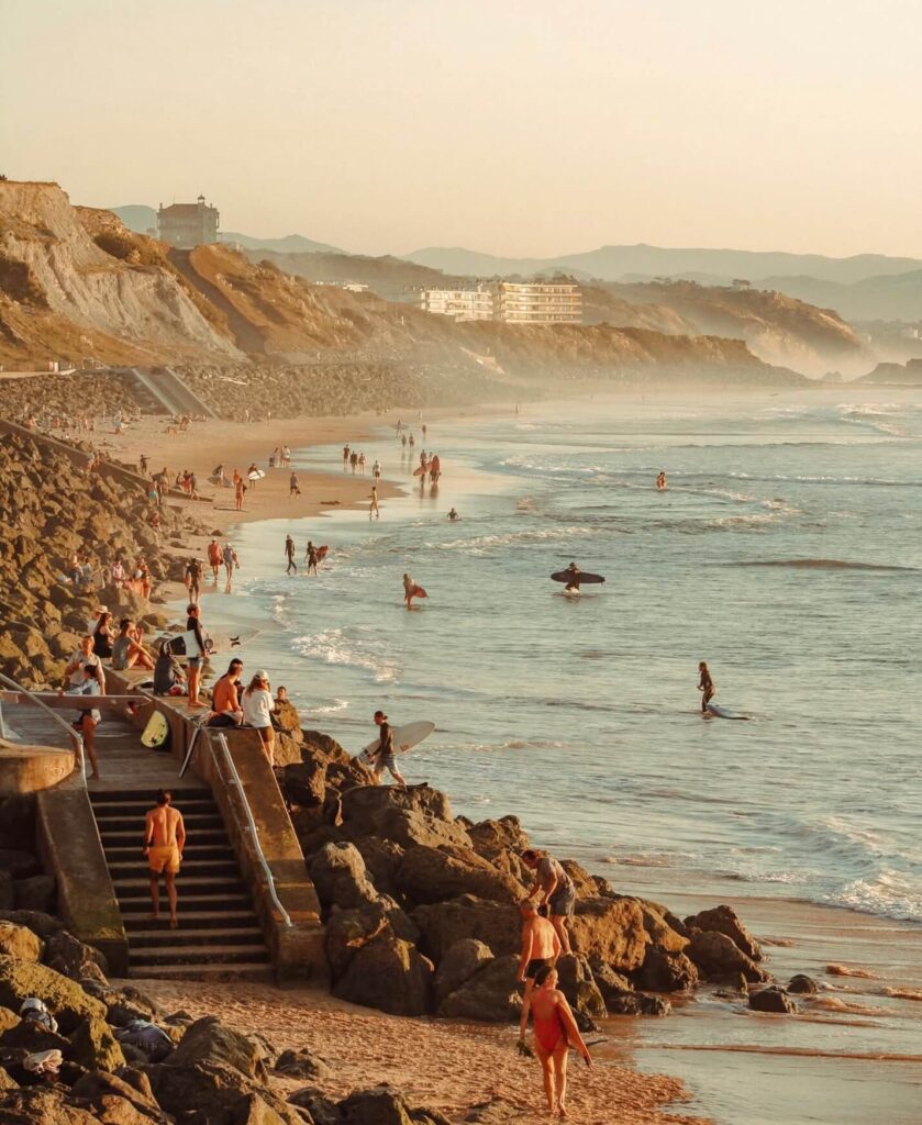 Cote des Basques Biarritz beach with surfers and ocean waves