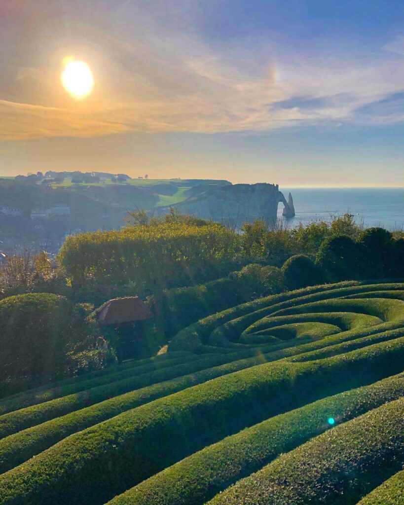 Path leading up Falaise d’Amont with views over Étretat
