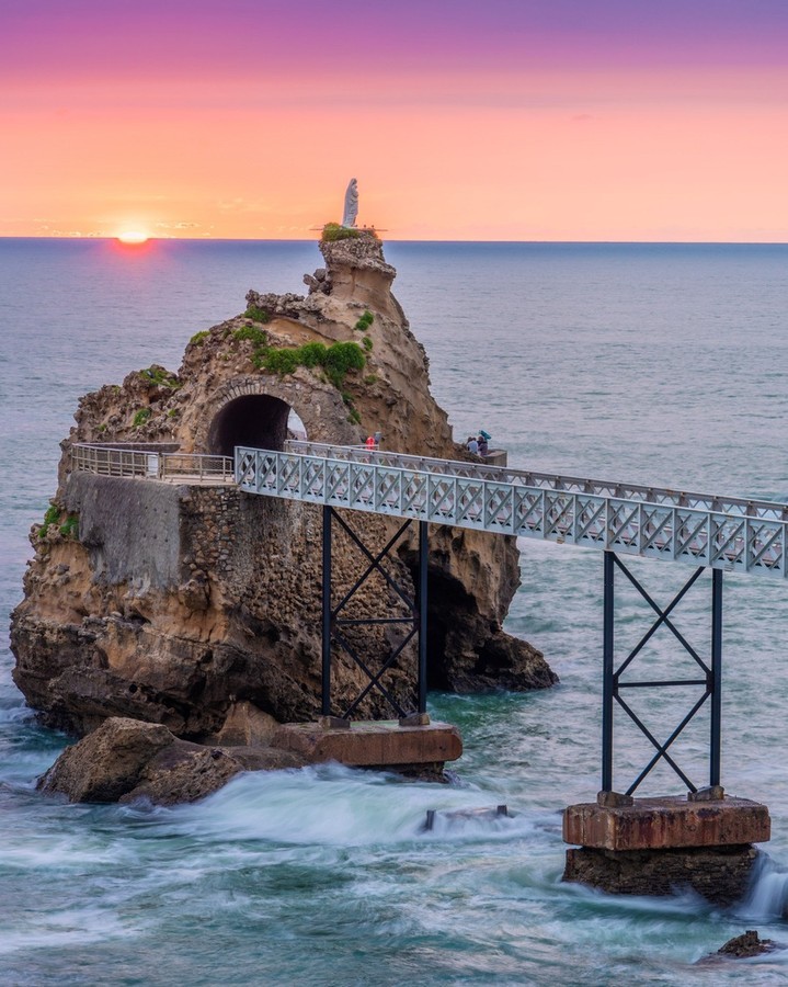Grande Plage Biarritz beach with promenade and ocean in soft morning light