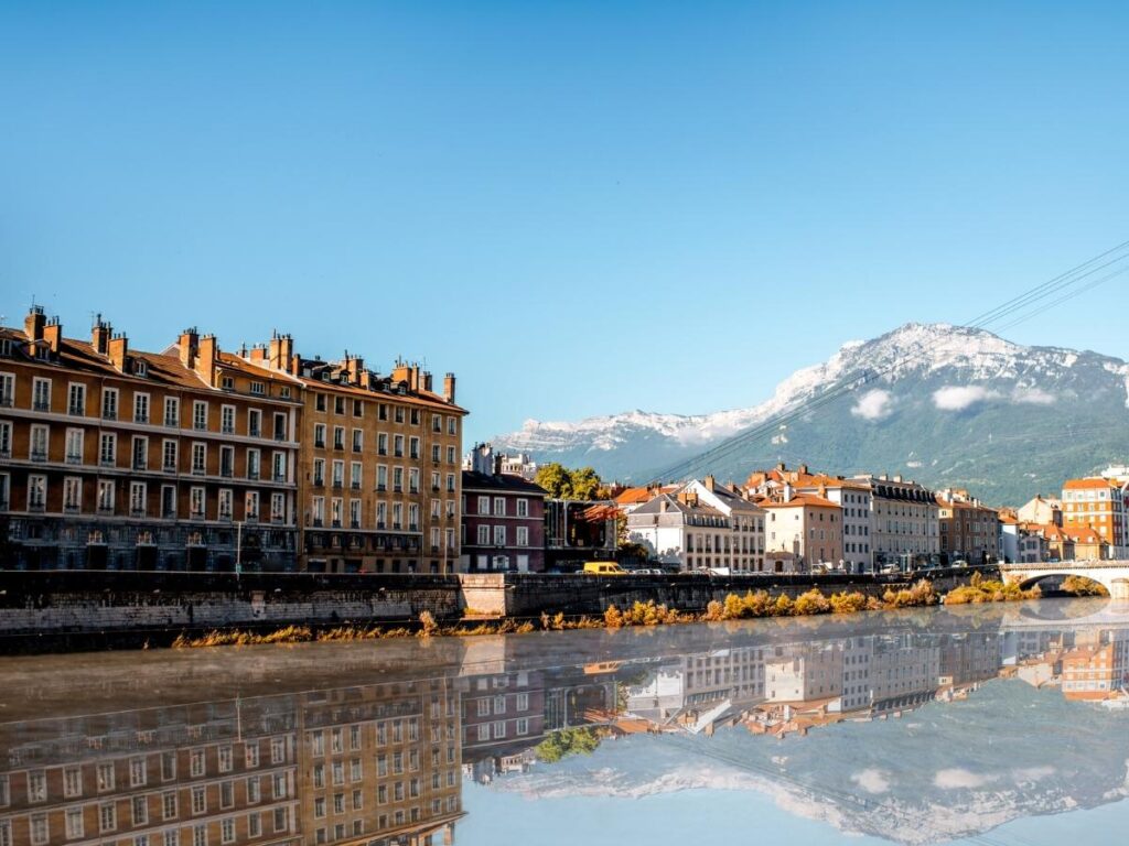 Evening view of Grenoble with mountains in the background