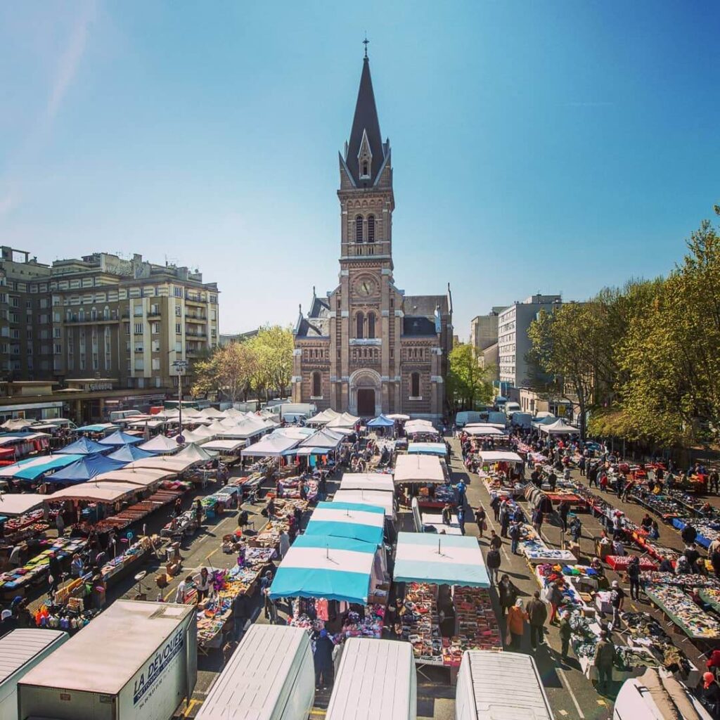 Local market in Grenoble with fresh food stalls