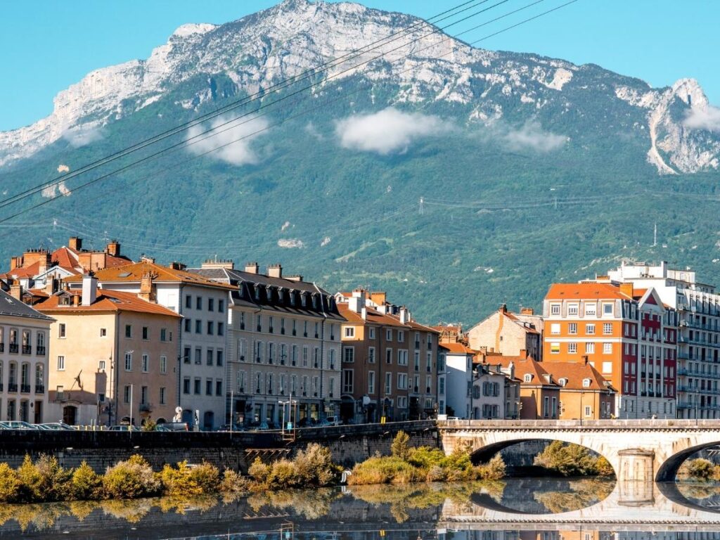 Grenoble with snow-covered mountains in winter