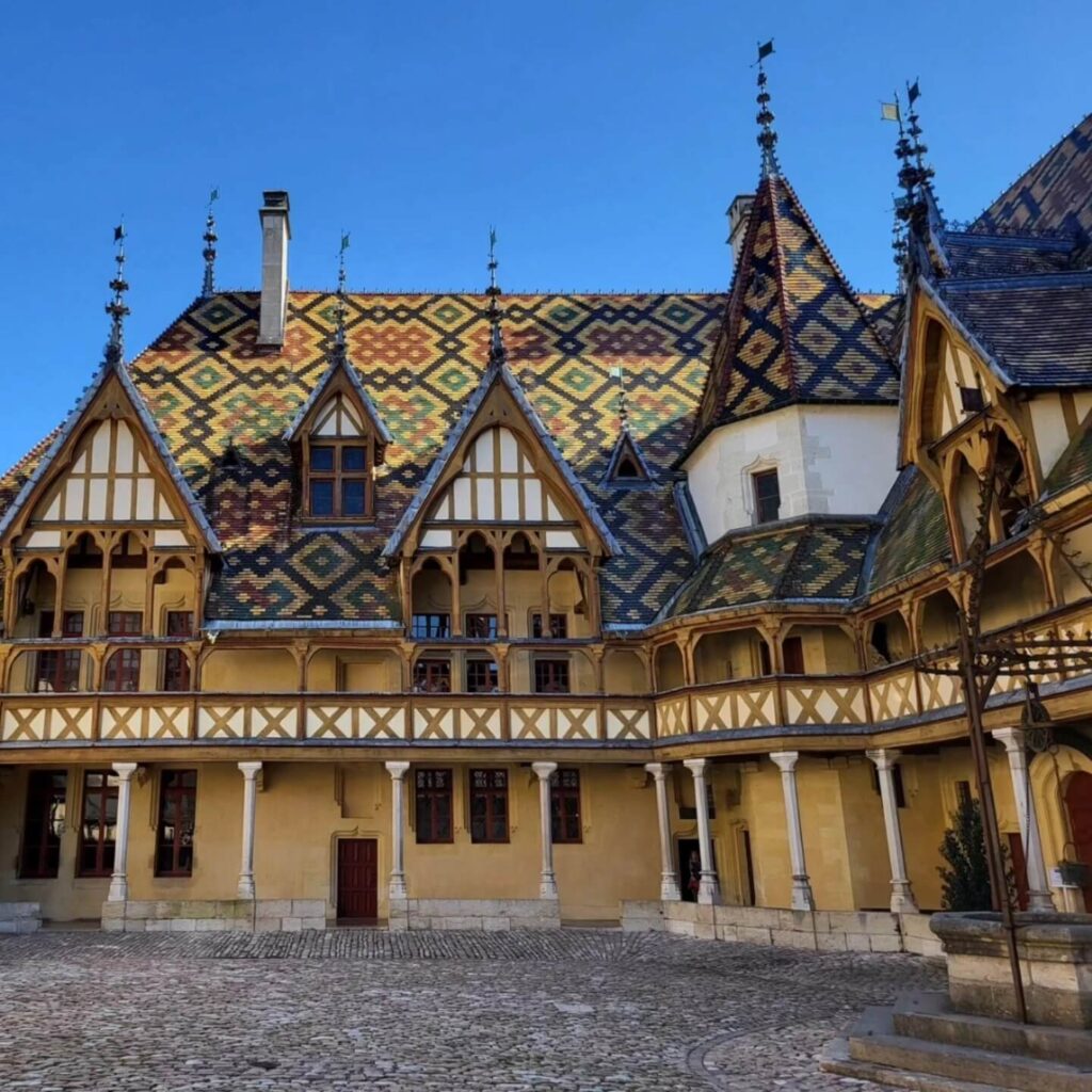 Colorful tiled roof of Hôtel Dieu in Beaune Burgundy