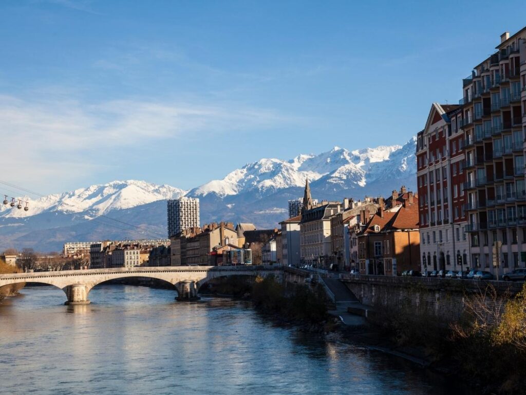 Colorful buildings along the Isere River in Grenoble