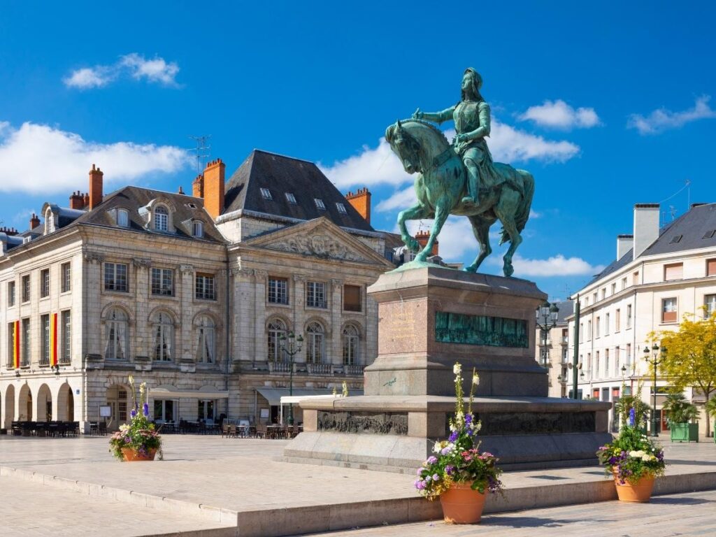 Joan of Arc historical sites in Orléans France with statue and buildings
