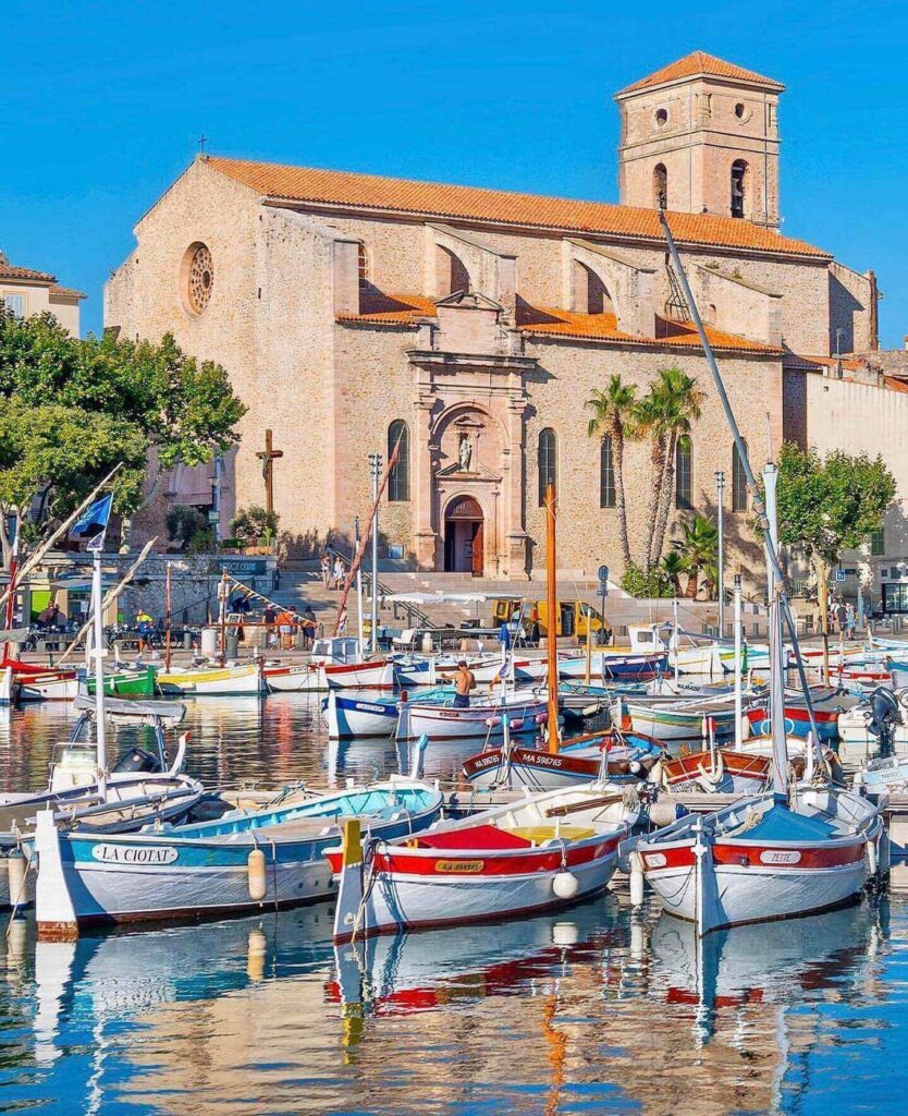 People walking along the waterfront in La Ciotat near the old port