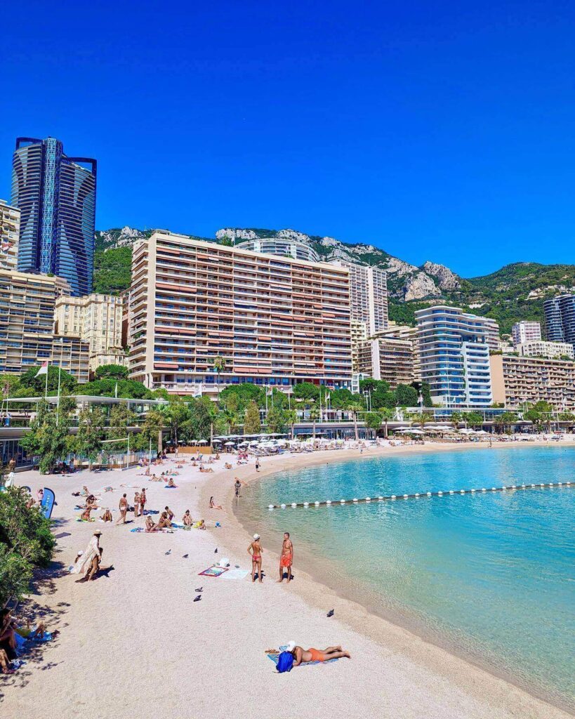 Larvotto Beach with clear water and promenade in Monaco