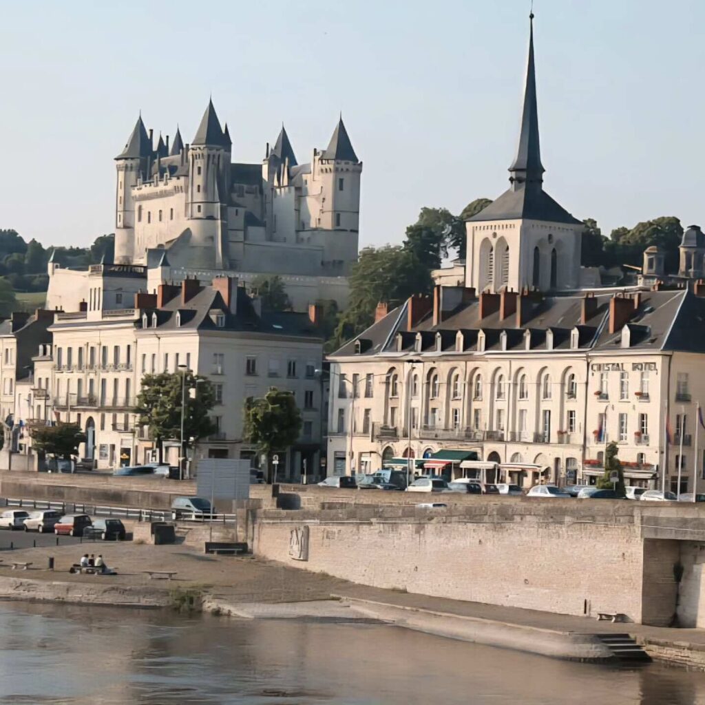 Peaceful walkway along the Loire River in Saumur at sunset