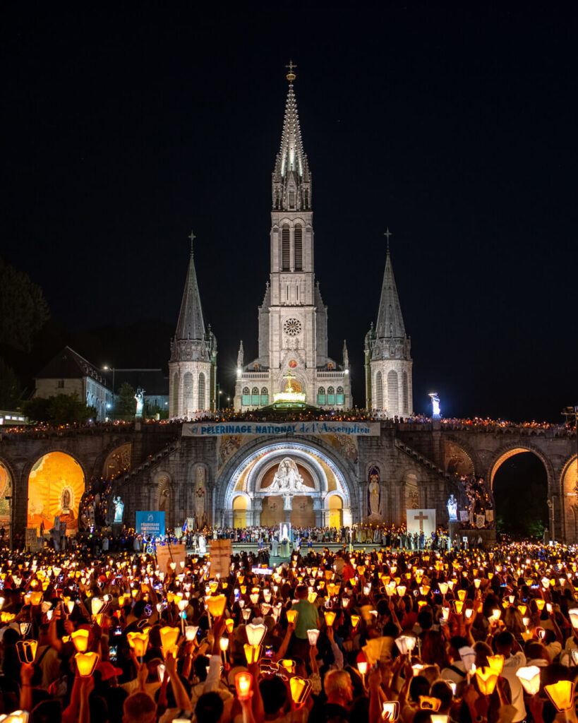 Candlelight procession at Lourdes sanctuary in the evening