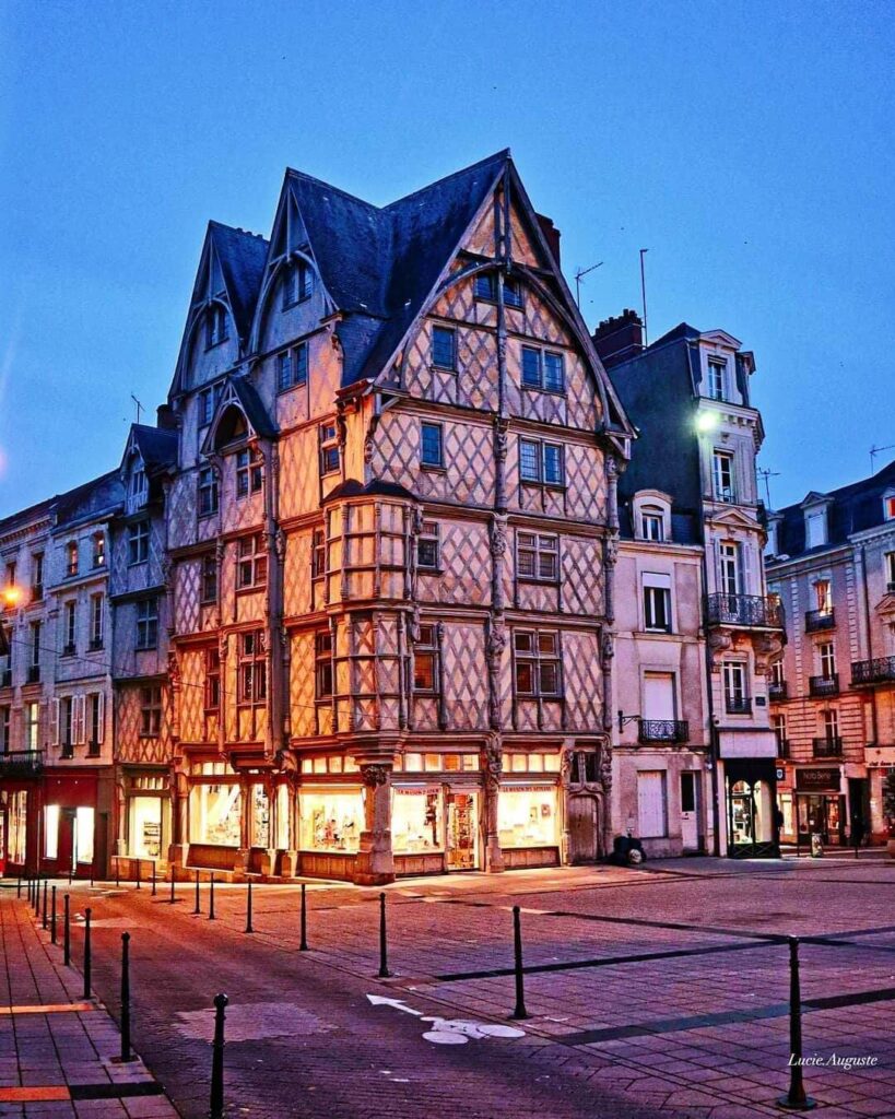Maison d’Adam timber framed house with carved details