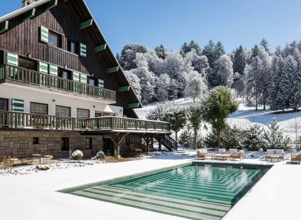 Outdoor heated spa pool in Megève with snowy mountain views