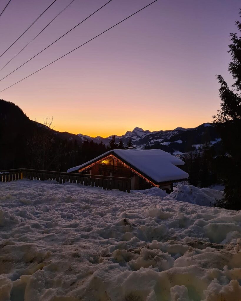 Sunset view over Megève village and mountains