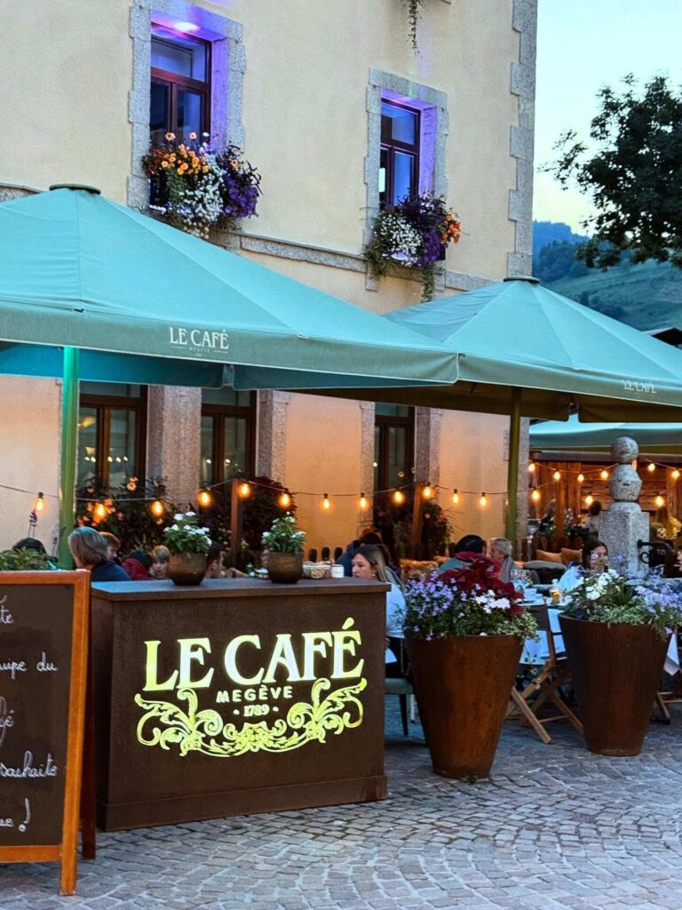 Streets and cafés in Megève village during summer