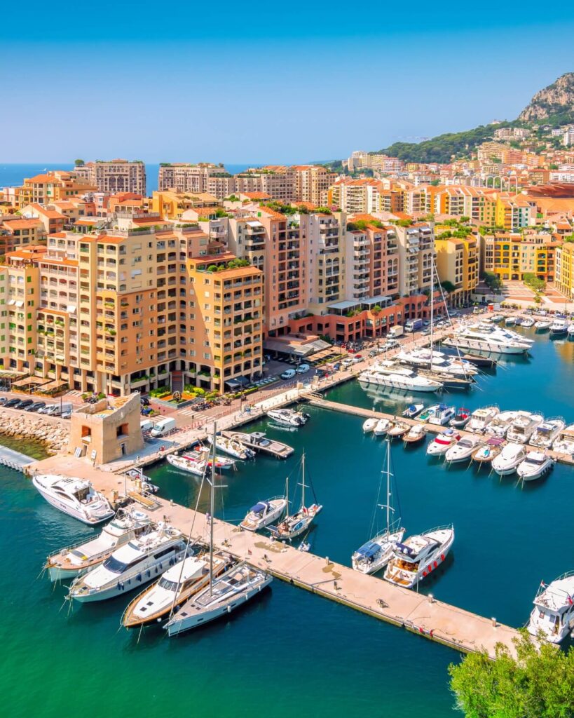 Sunset over Monaco harbor and city skyline