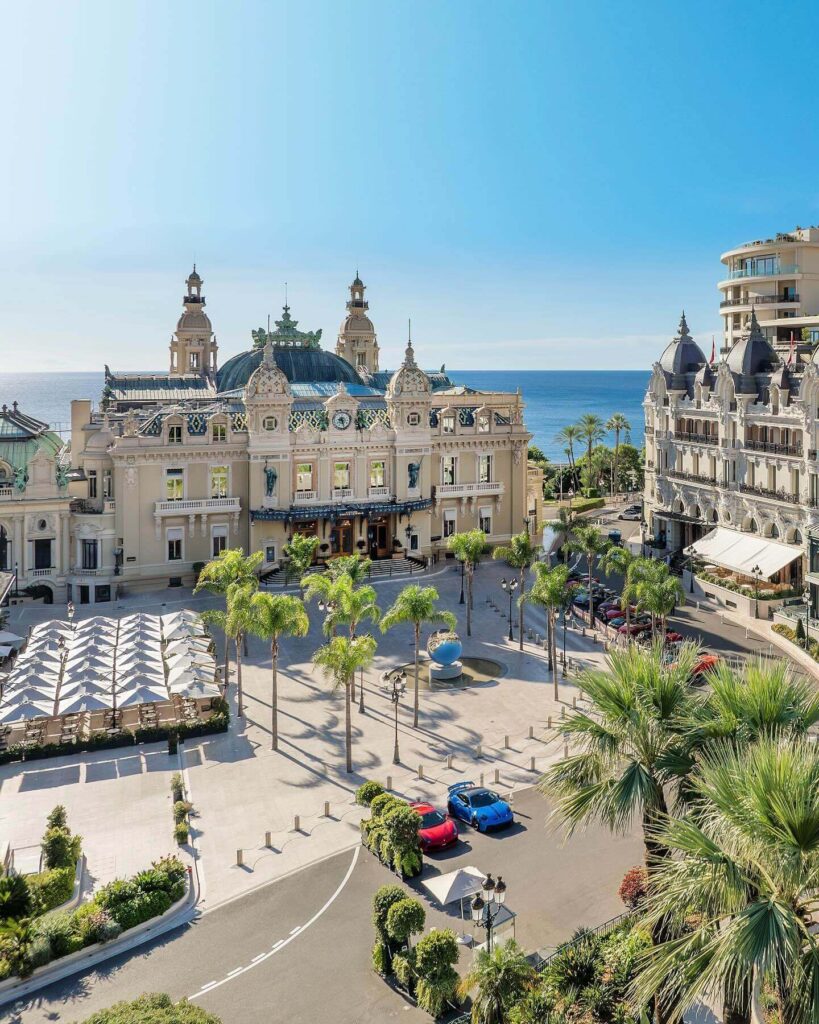 Monte Carlo Casino square in the evening with lights and activity