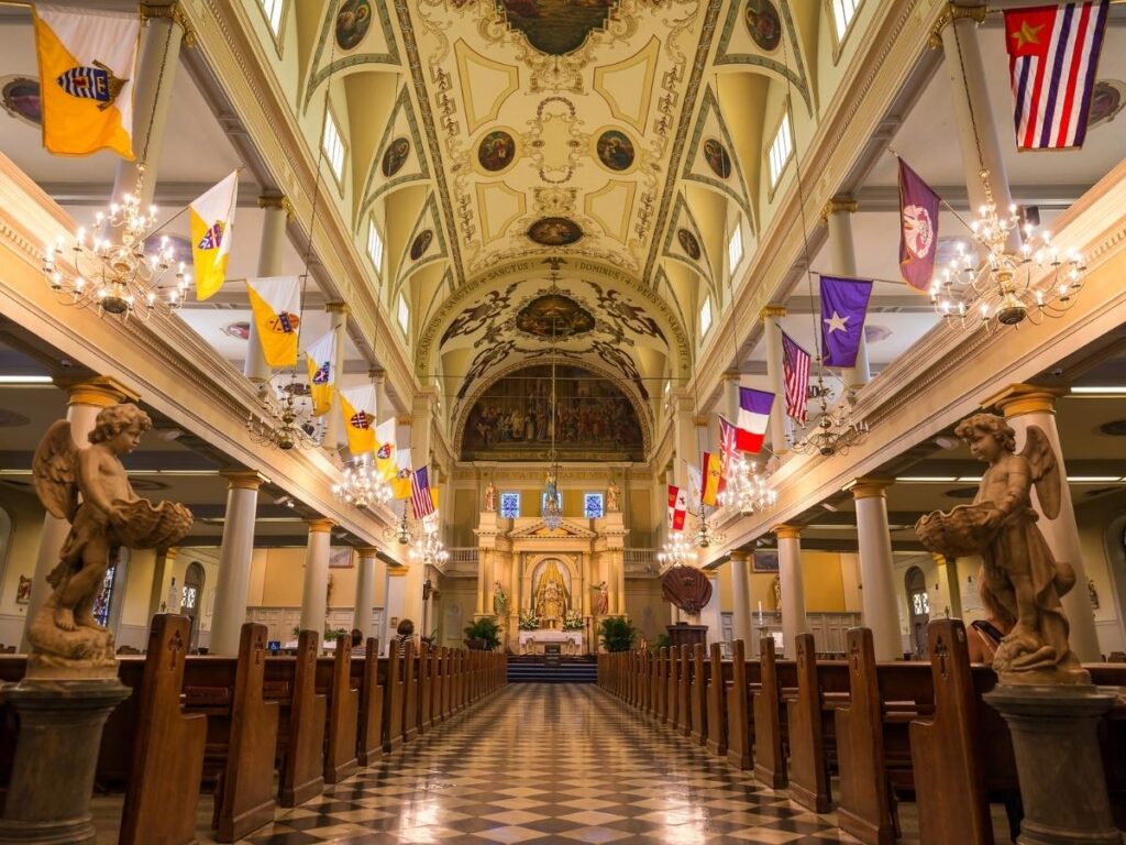 Interior of Orléans cathedral with stained glass and high ceilings