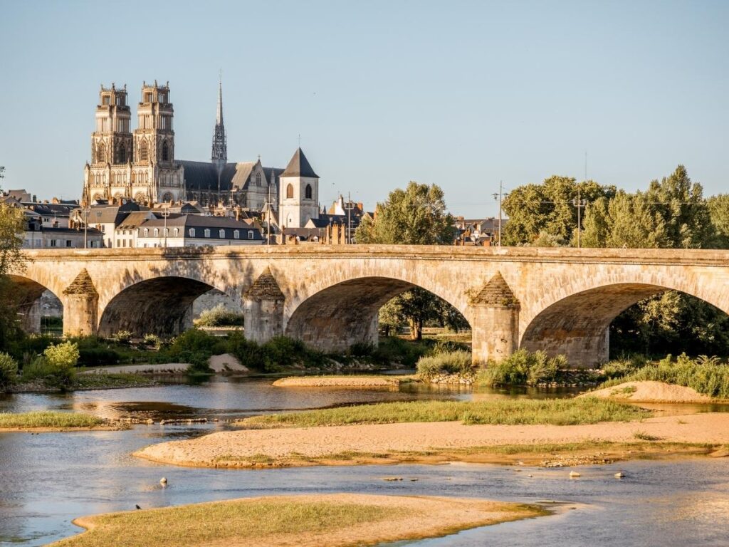Loire River in Orléans with bridges and city views on a calm day