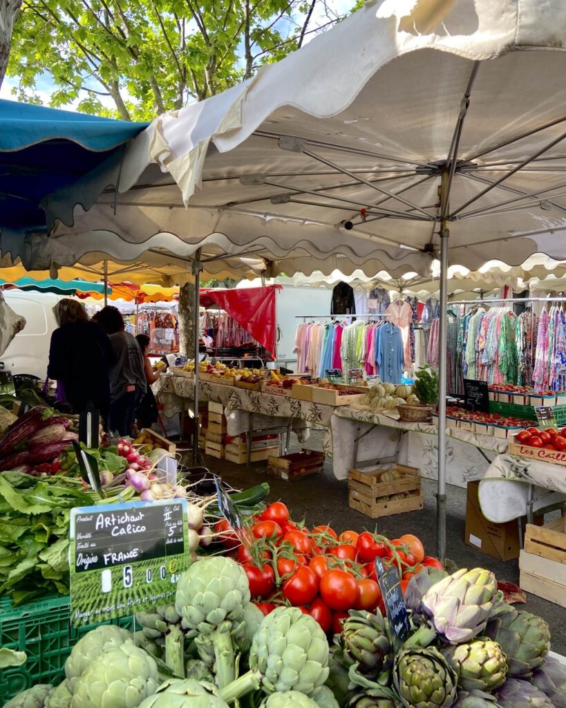 Market stalls and local life at Place des Lices in Saint Tropez