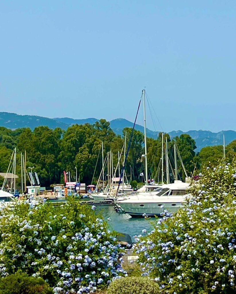 Porto Vecchio beach in early morning compared to busy afternoon