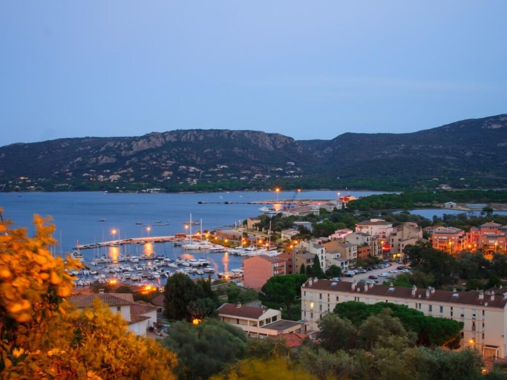 Sunset over Porto Vecchio harbor with warm evening atmosphere